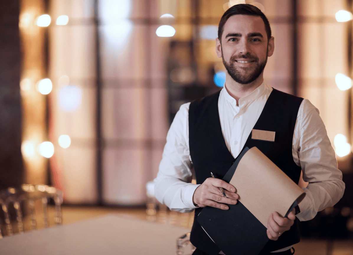 Hotel manager welcoming guests