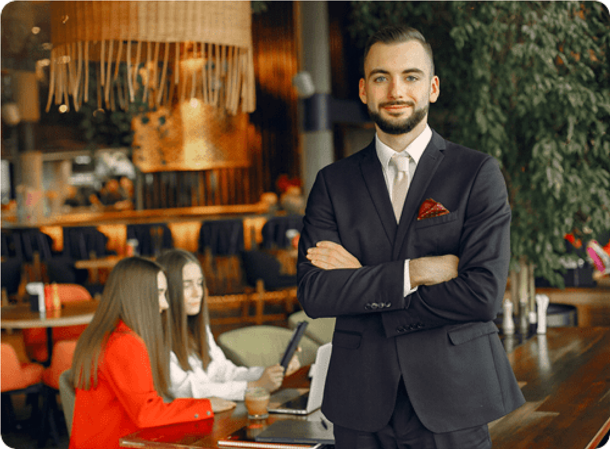 Restaurant owner in a busy dining room